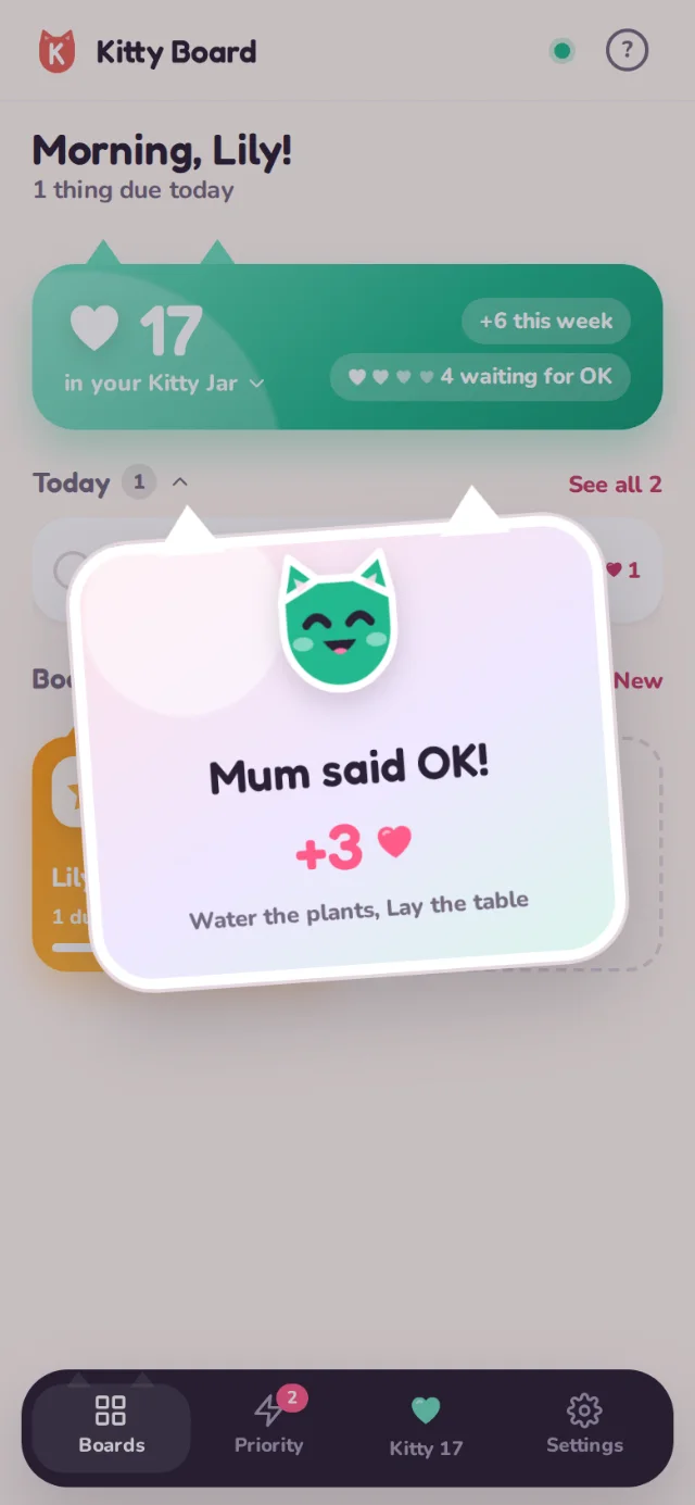 A sticker celebration on Lily’s phone: Mum said OK! plus 3 hearts